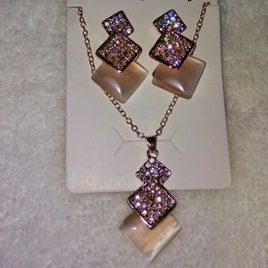 Sold Rose gold necklace and earring set